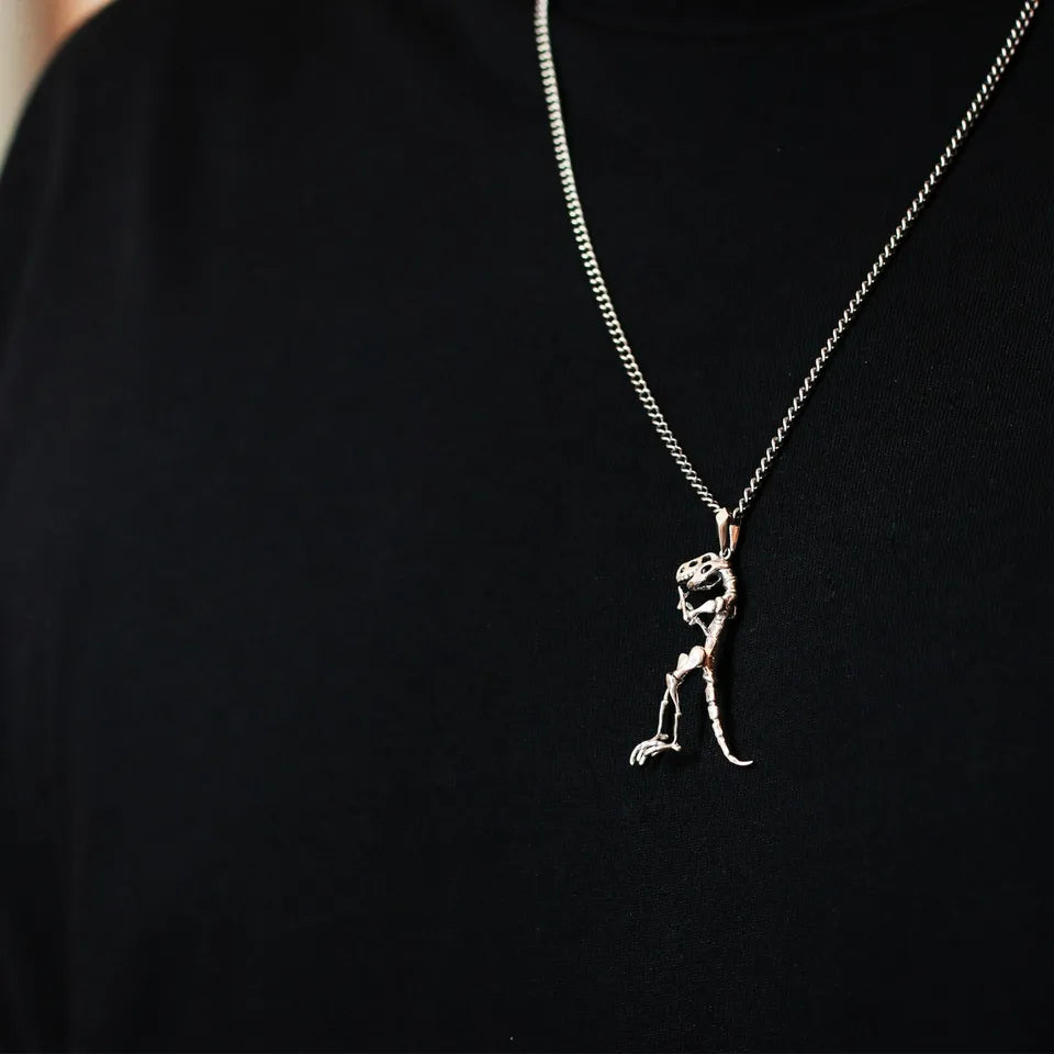 Silver Dinosaur necklace. Very cool gift for him. Velociraptor Pendant.