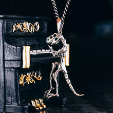 Load image into Gallery viewer, Silver Dinosaur necklace. Very cool gift for him. Velociraptor Pendant.